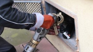 A Beems Distributing expert connects fuel lines